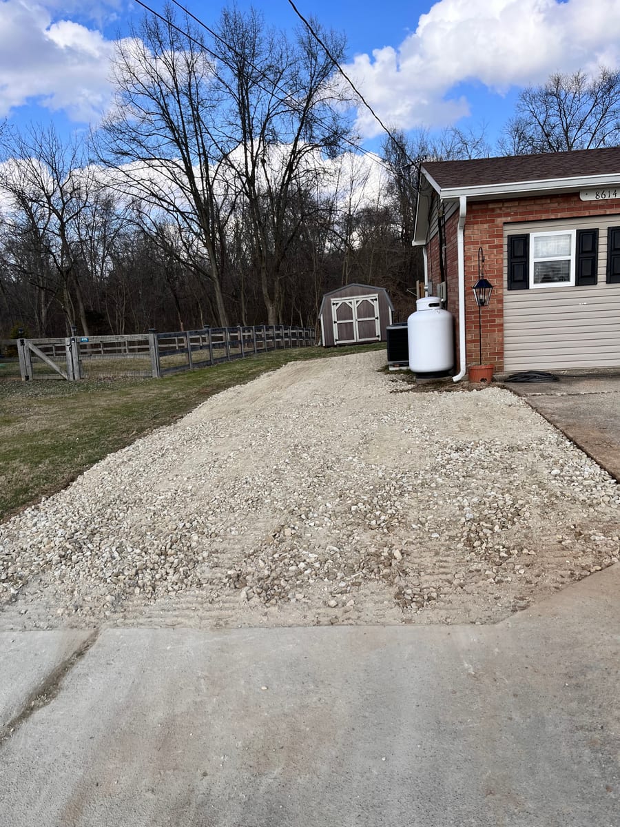 Concrete slab tear-out and removal — driveway and foundation demo